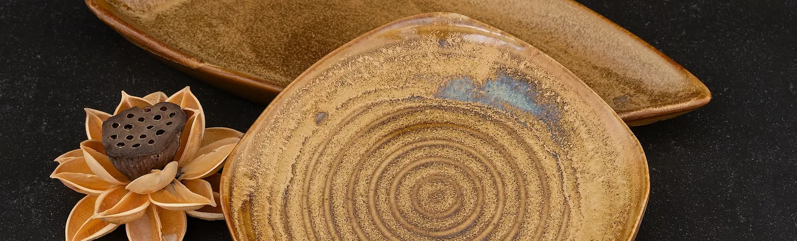 Annamis reactive-glaze porcelain collection arranged on a table